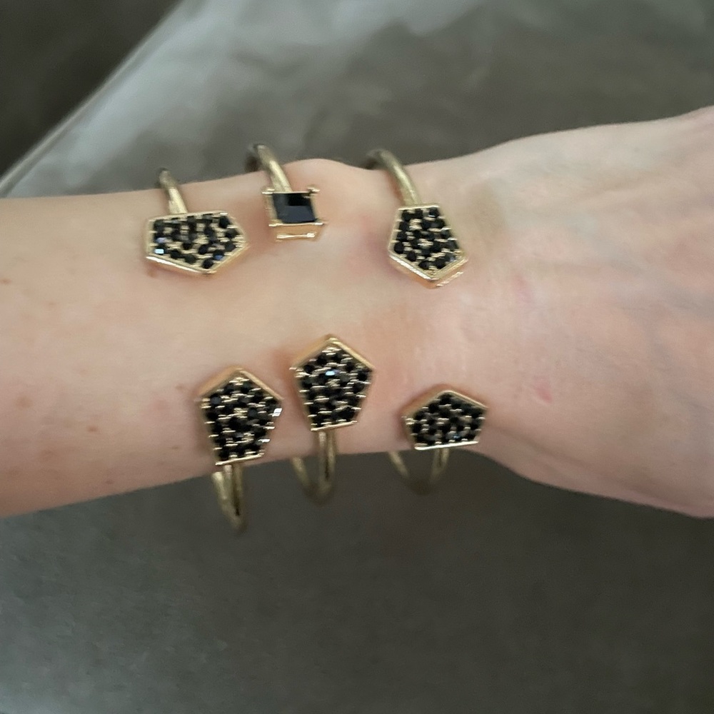 Set of 3 gold and black bangle bracelets